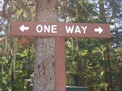 one way street sign pointing in both directions
