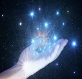 Hand of a starseed holding light