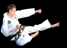 Taekwondo martial artist kicking in air